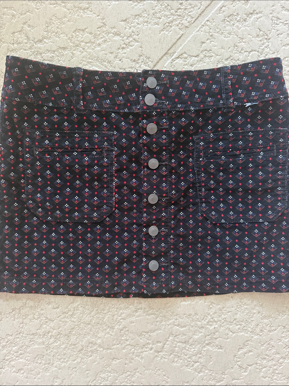 We The Free Black Mini Skirt with Red and Blue Geometric Print